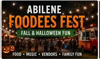 Abilene Foodees Fest in Abilene, Texas with food trucks, pumpkins, string lights and fall Halloween decorations